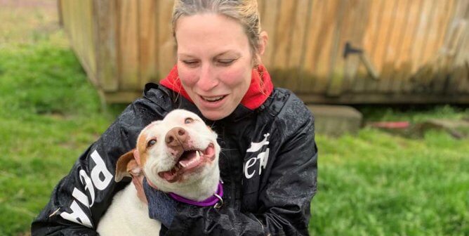 PETA field team staff member and Princess the dog