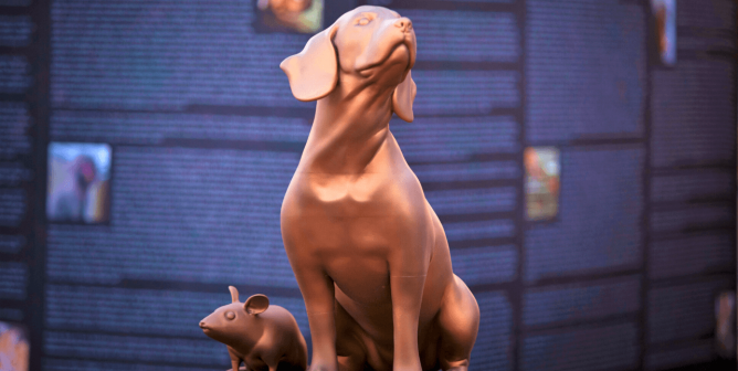 Statue of a dog and mouse