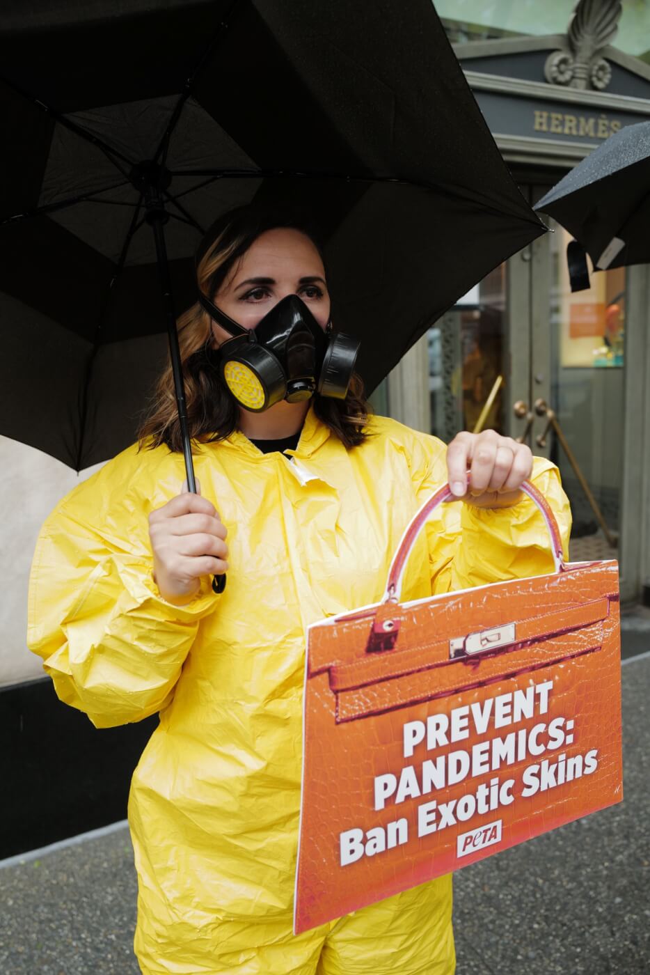 Hazmat suits and high heels PETA protest outside Hermes NYC