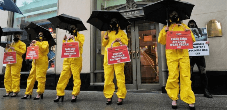 PETA Protests Hermès Flagship in Heels and Hazmat Suits