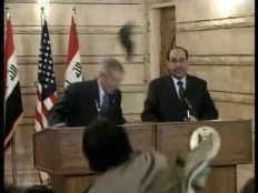 Bush getting shoes thrown at him