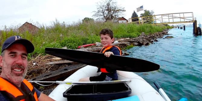 Father and son trash fishing