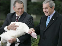 President Bush pardoning a turkey