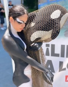 lolita protest miami orca body paint collage left
