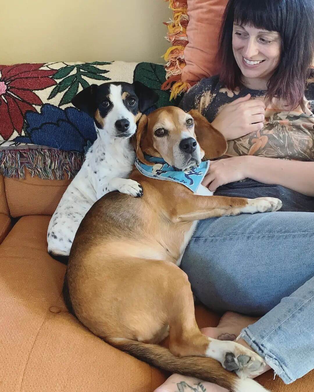 Pancake, a dog rescued by PETA, with her new family