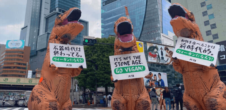 ‘Dinosaurs’ Take to Tokyo Streets With Urgent Message