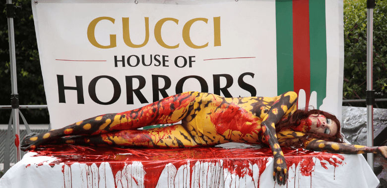 ‘Bloody Lizard’ Writhes Outside Gucci Store