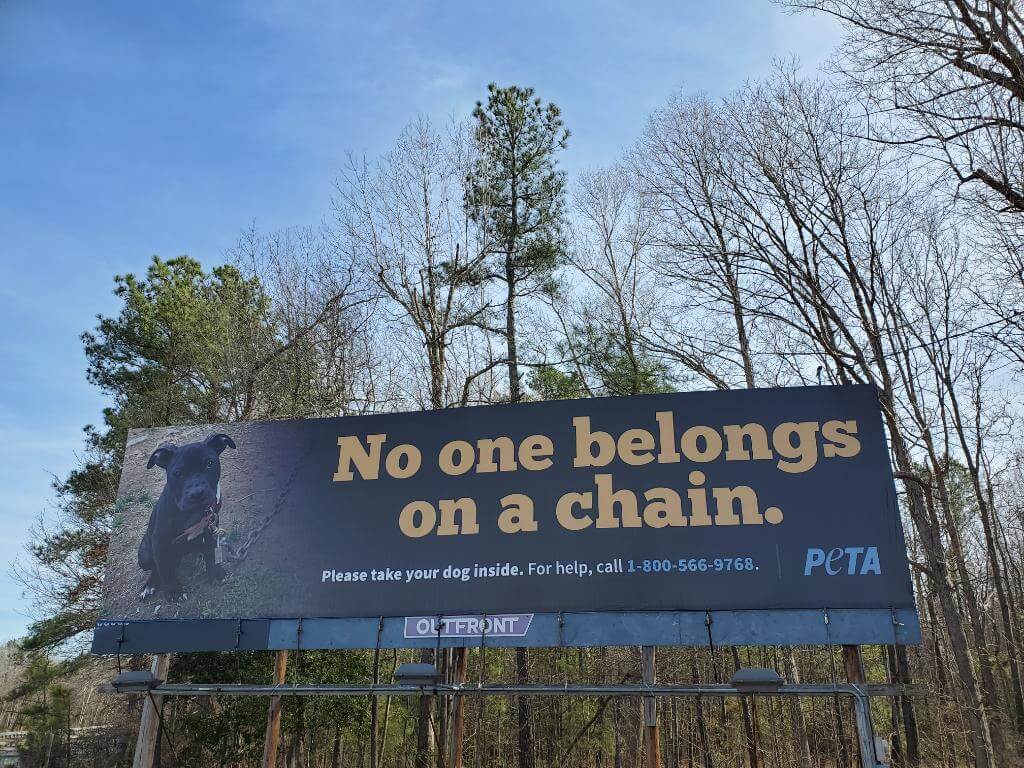 no one belongs on a chain billboard displayed in halifax, nc
