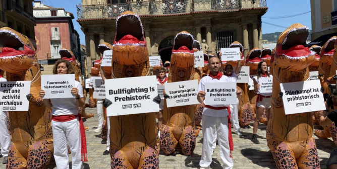‘Dinos’ Roam the Earth to Call For Extinction of the Running of the Bulls