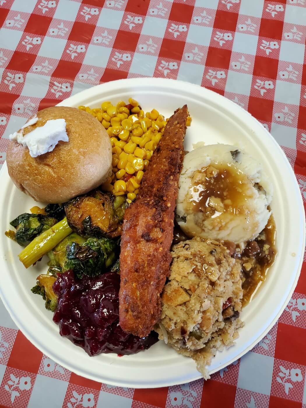 vegan thanksgiving plate with seitan turkey breast from green new american
