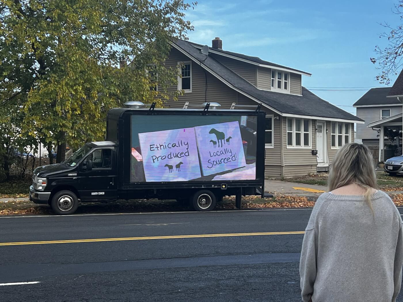 Spectator at "Happy Wool" Mobile Billboard at Fiber Festival of New England