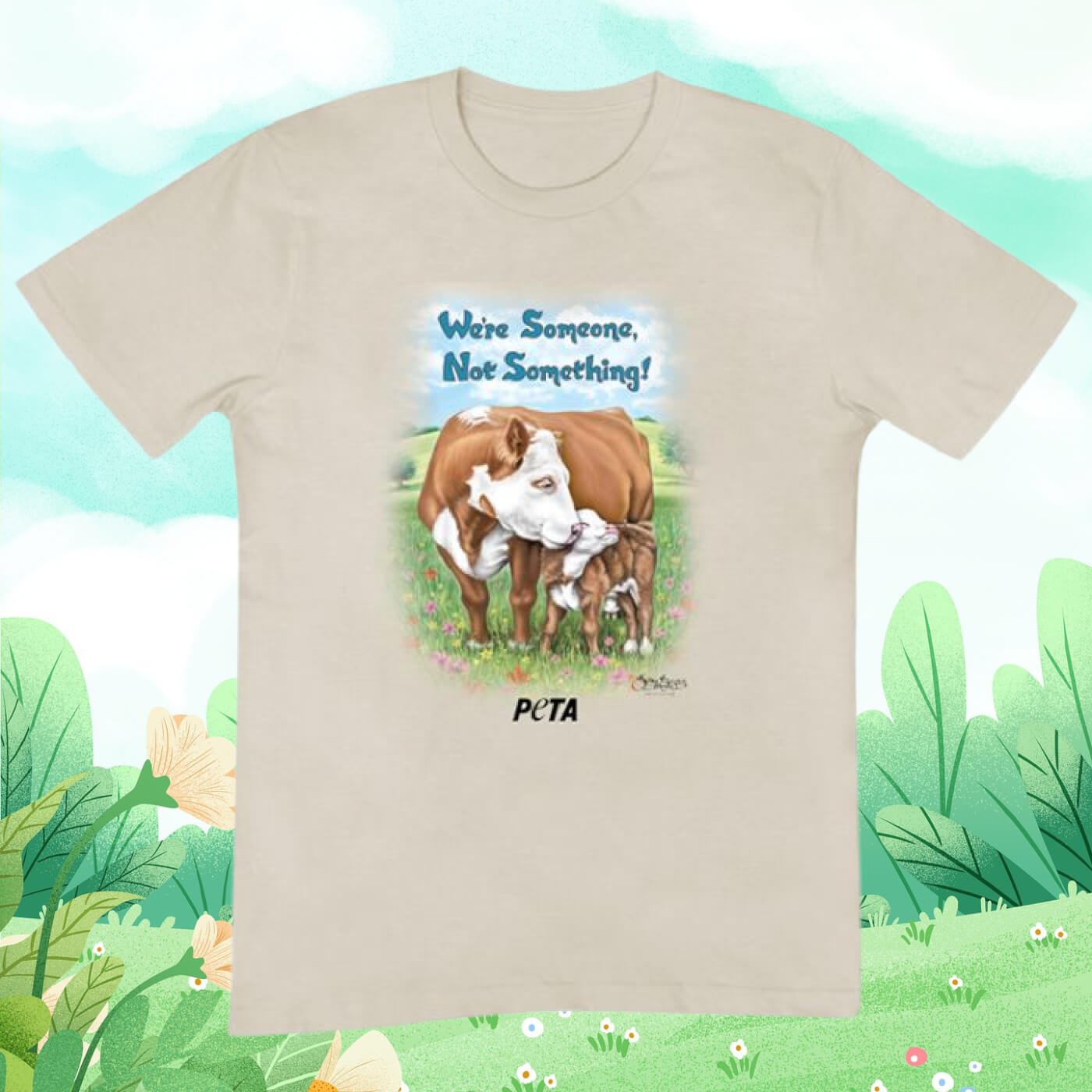 Betsy Baytos cow design on a beige tee
