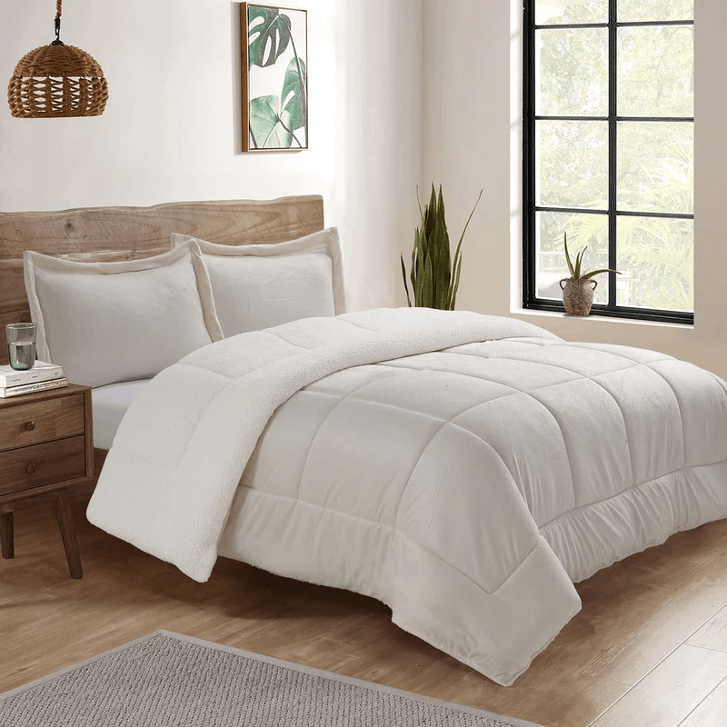 white vegan micro mink comforter on a bed from overstock