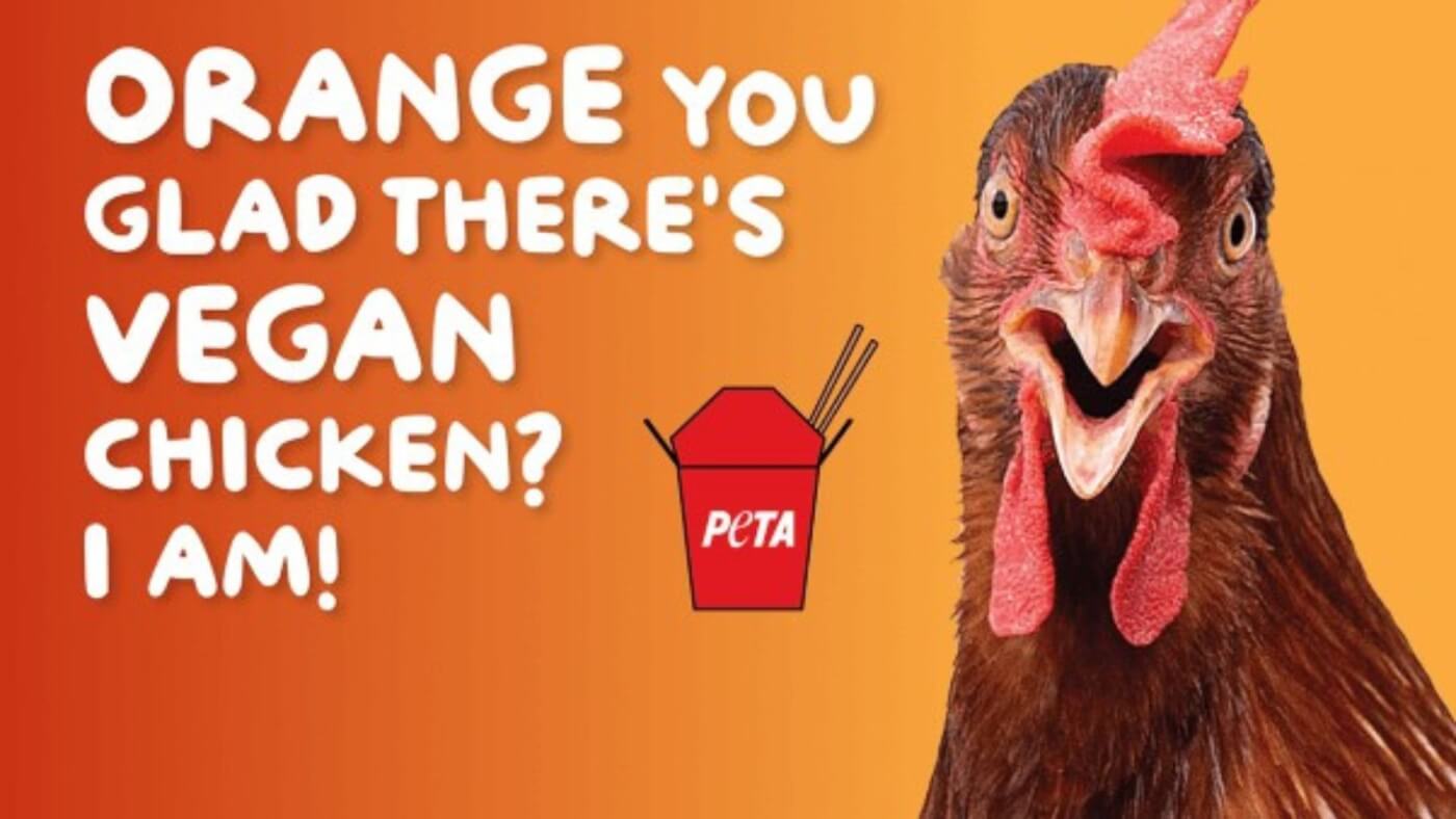 vegan fast food news of 2022 with PETA billboard for vegan orange chicken at panda express