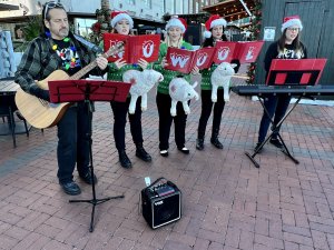 protesters sing to stop wearing wool Sleigh What?! Carolers in Shockingly ‘Ugly’ Christmas Sweaters to Sing for a Wool-Free Winter