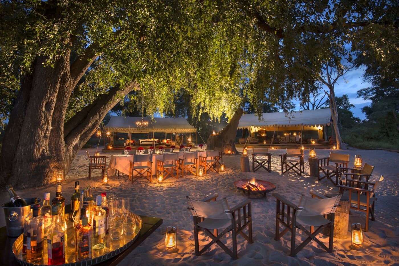 night photo of an outdoor dining area at Great Plains Conservation