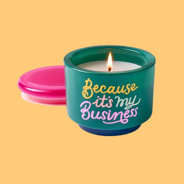 Tabitha Brown for Target candle with "Because it's my business" written on it