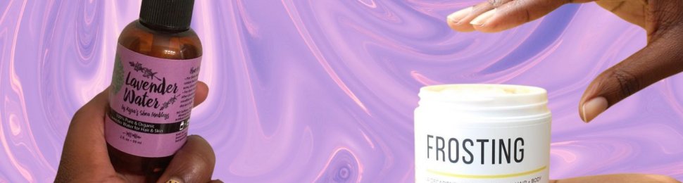 Black owned beauty spray and cream in front of swirling purple background