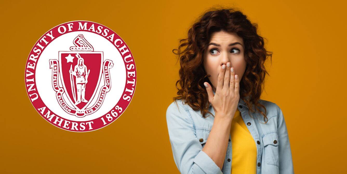 umass woman looking at old seal PETA Offers UMass a New, More Accurate School Seal
