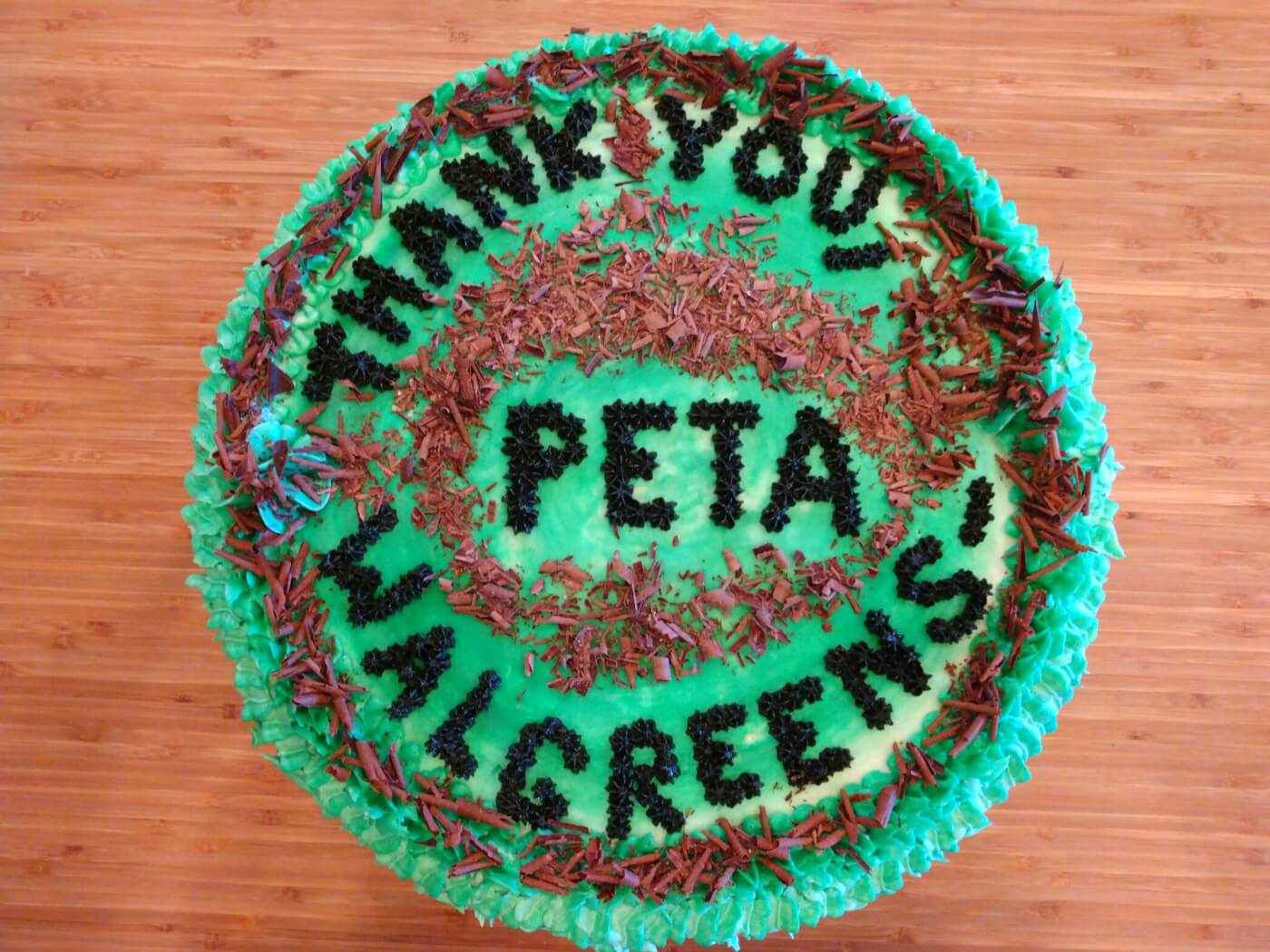 green vegan cake that says thank you Walgreens