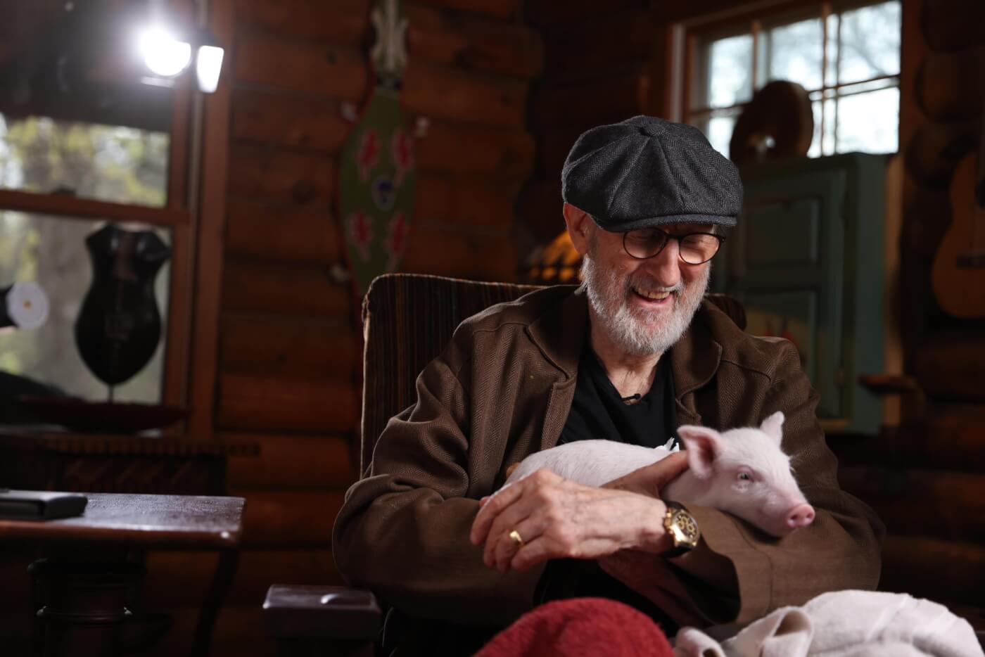 James Cromwell with rescued pig Babe inside