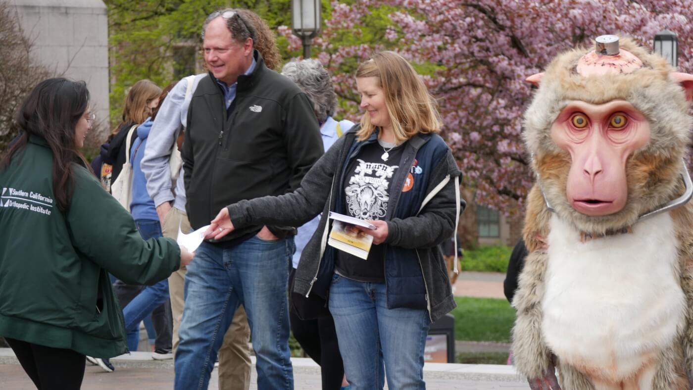 Photo of PETA organizers passing out leaflets.