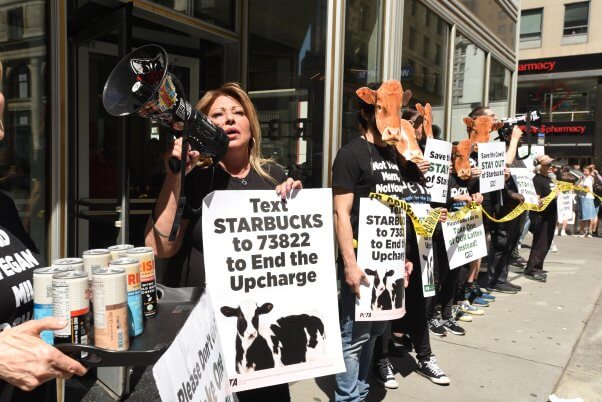 megaphone protester at starbucks demo