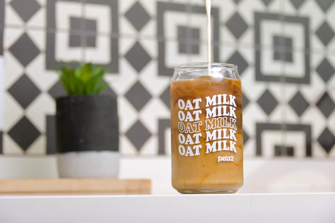 oat milk latte on a counter