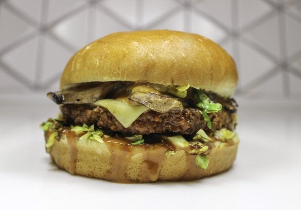 close shot of the Flatiron burger from Meta Burger