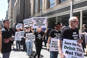protesters walking around starbucks