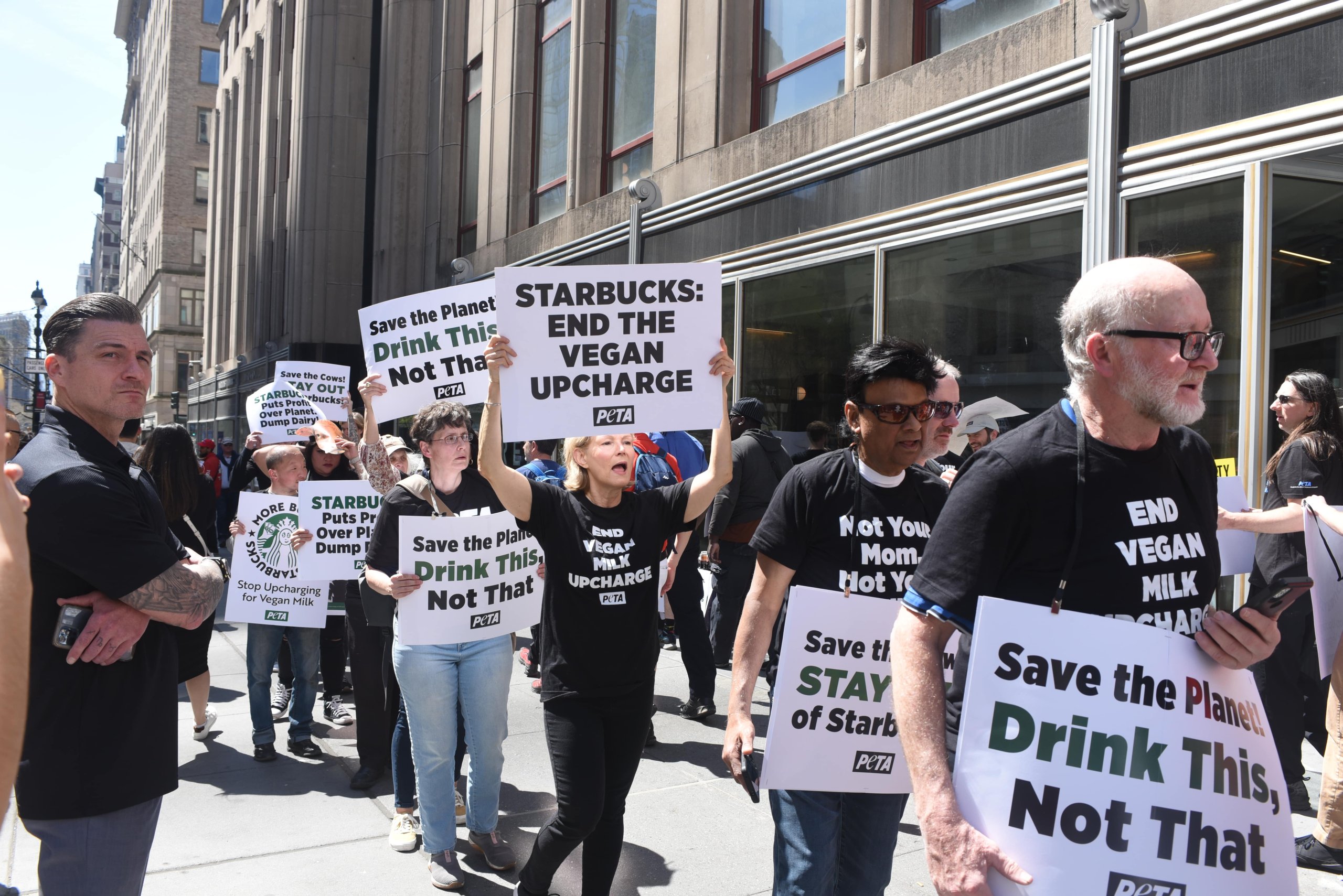 protesters walking around starbucks