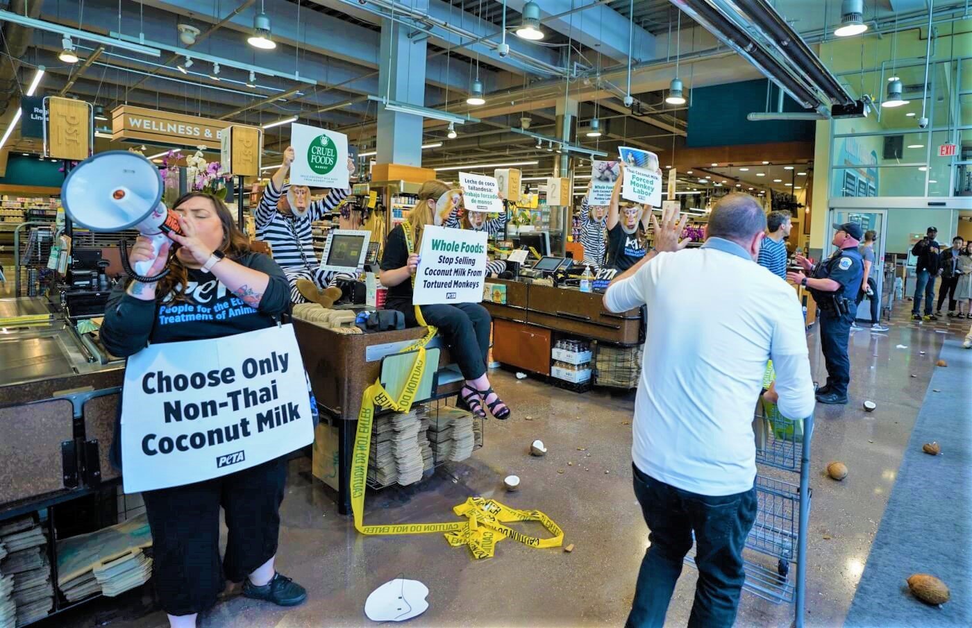 whole foods coconut protest june PETA Members Arrested During Protest at Whole Foods