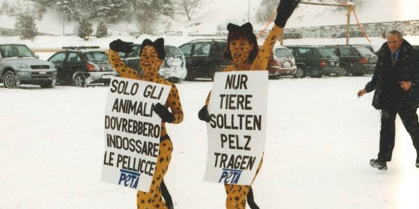 two women wearing bikinis in the snow for a peta germany demonstration