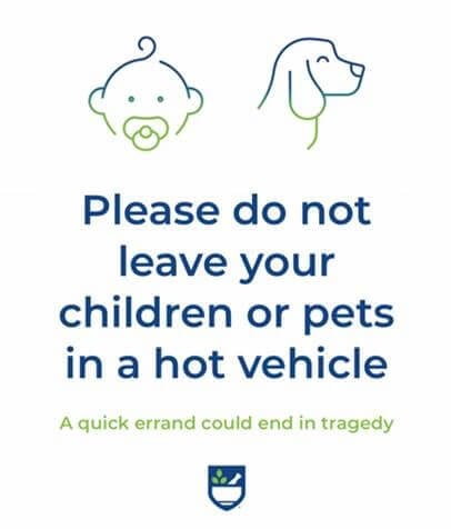 Sign that reads please do not leave your children or pets in a hot vehicle