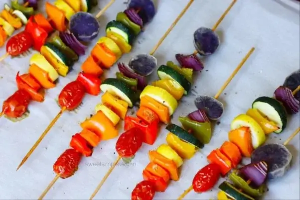 skewers with various vegetables in rainbow colors