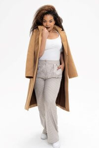 Ashley Jackson wearing a vegan fur coat by Unreal Fur