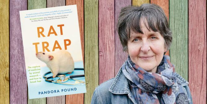 Dr. Pandora Pound next to book Rat Trap with colorful wood background