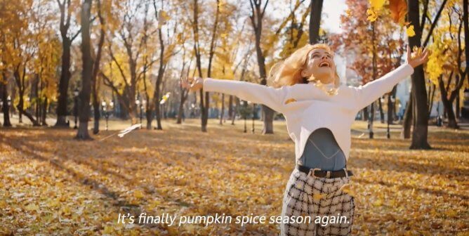 woman spins through fall scene to celebrate 'pumpkin spice latte season' in PETA video