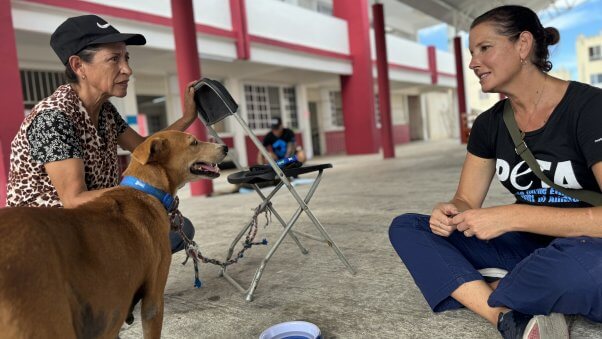 PETA staff talks with locals about animal companions