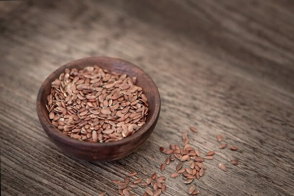 small bowl of flax seeds