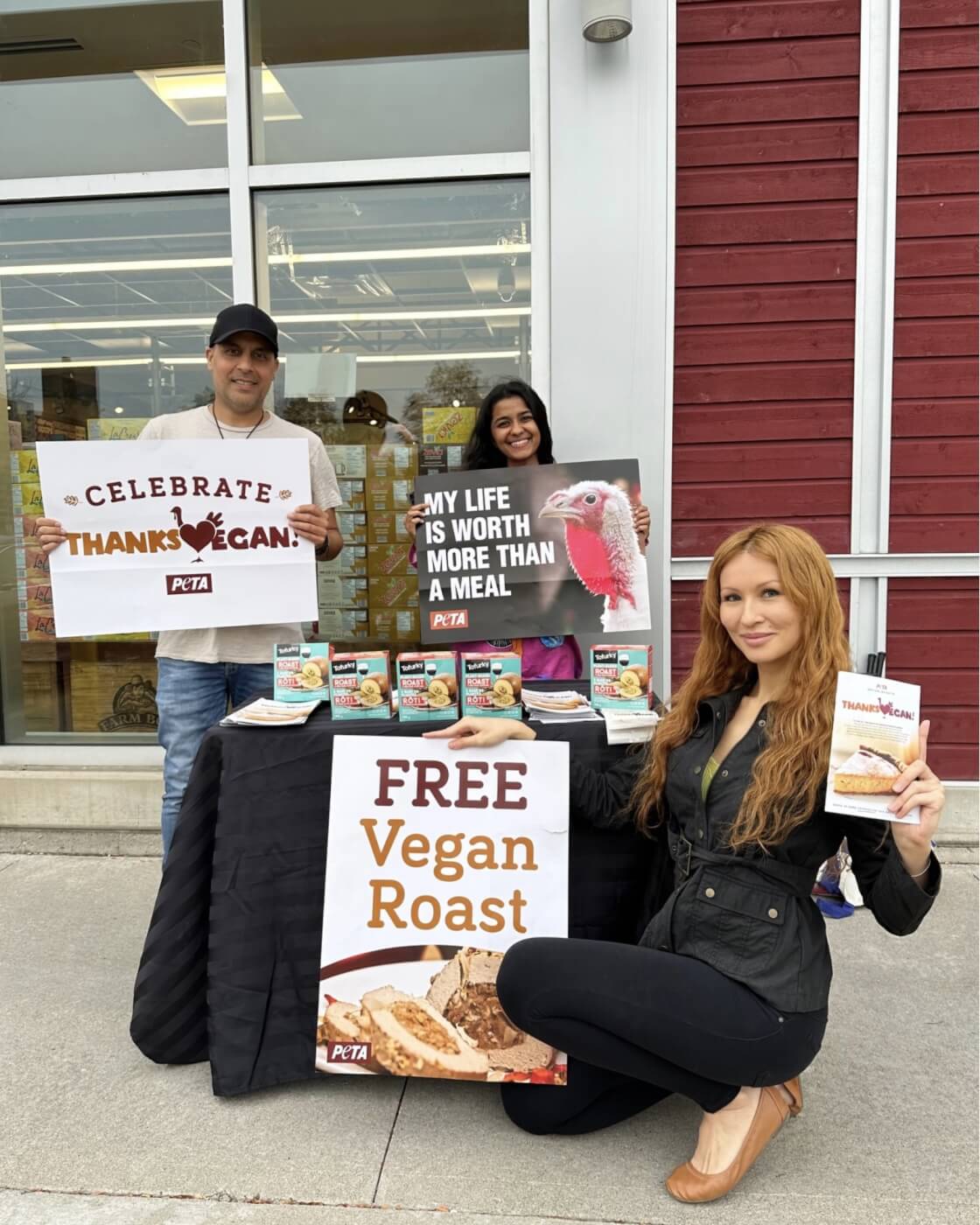 peta supporters handing out free vegan roasts