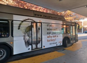 if you wouldnt eat your dog why eat a turkey bus ad Victory! Tulsa Transit Reverses Ban on PETA’s ‘Controversial’ Pro-Vegan Ads