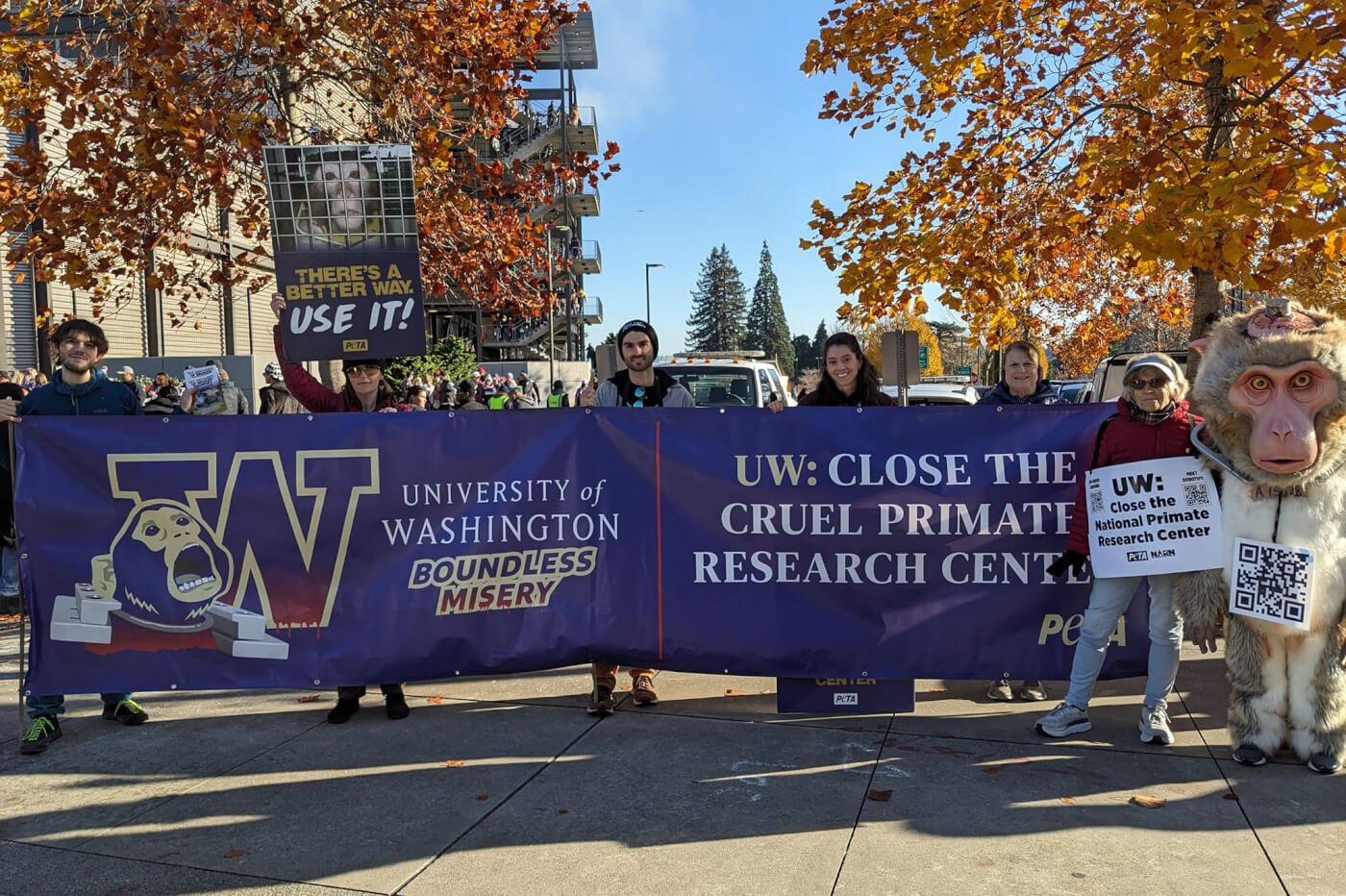 A group of demonstrators with a banner