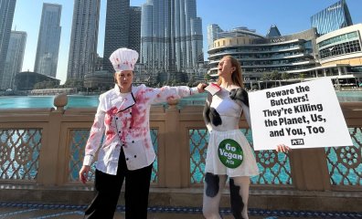 PHOTOS: PETA U.K. ‘Cow’ and ‘Butcher’ Hit COP28 With Warning to Flesh Peddlers Infiltrating a Conference
