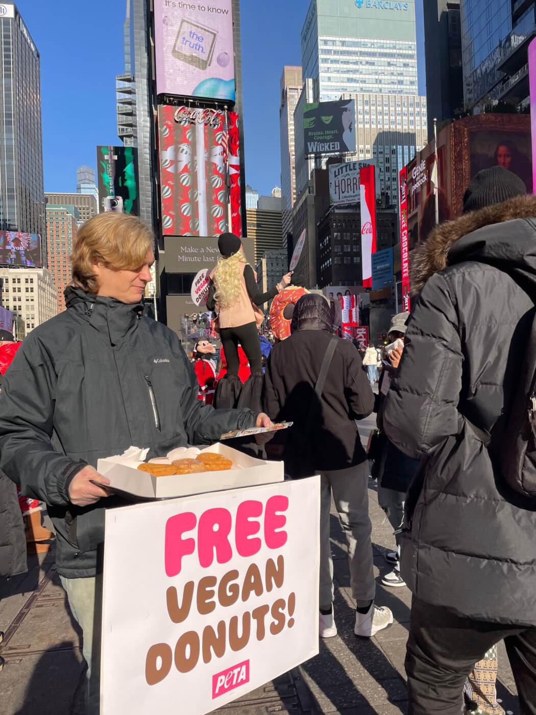 PETA hands out free vegan donuts in Times Square