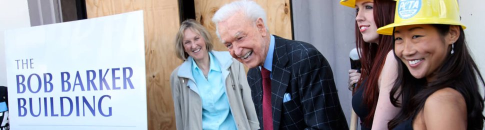 Bob Barker cutting a ribbon at the opening for the Bob Barker Building