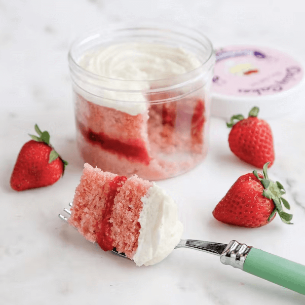 A pink vegan mini cake in a jar, from Daisy Cakes