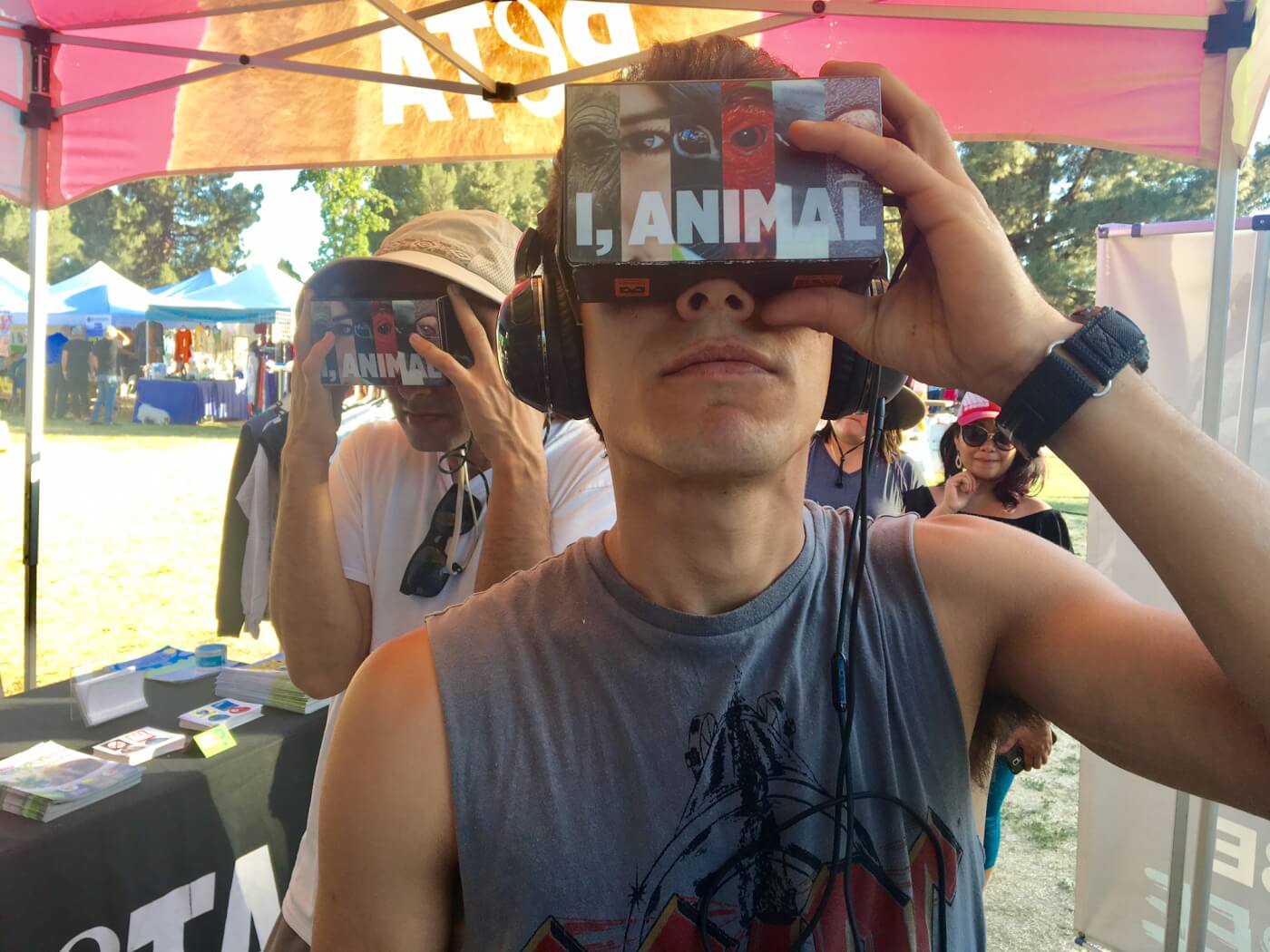 passersby experiencing PETA's virtual reality programs to gain empathy for our fellow animals