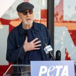 James Cromwell speaking at a PETA podium