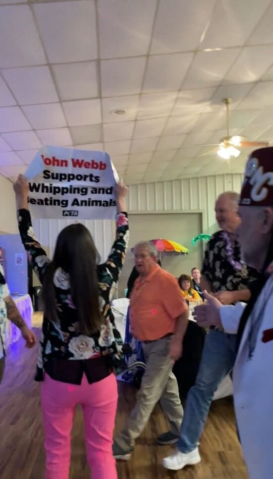 Protester at Sharon Shrine
